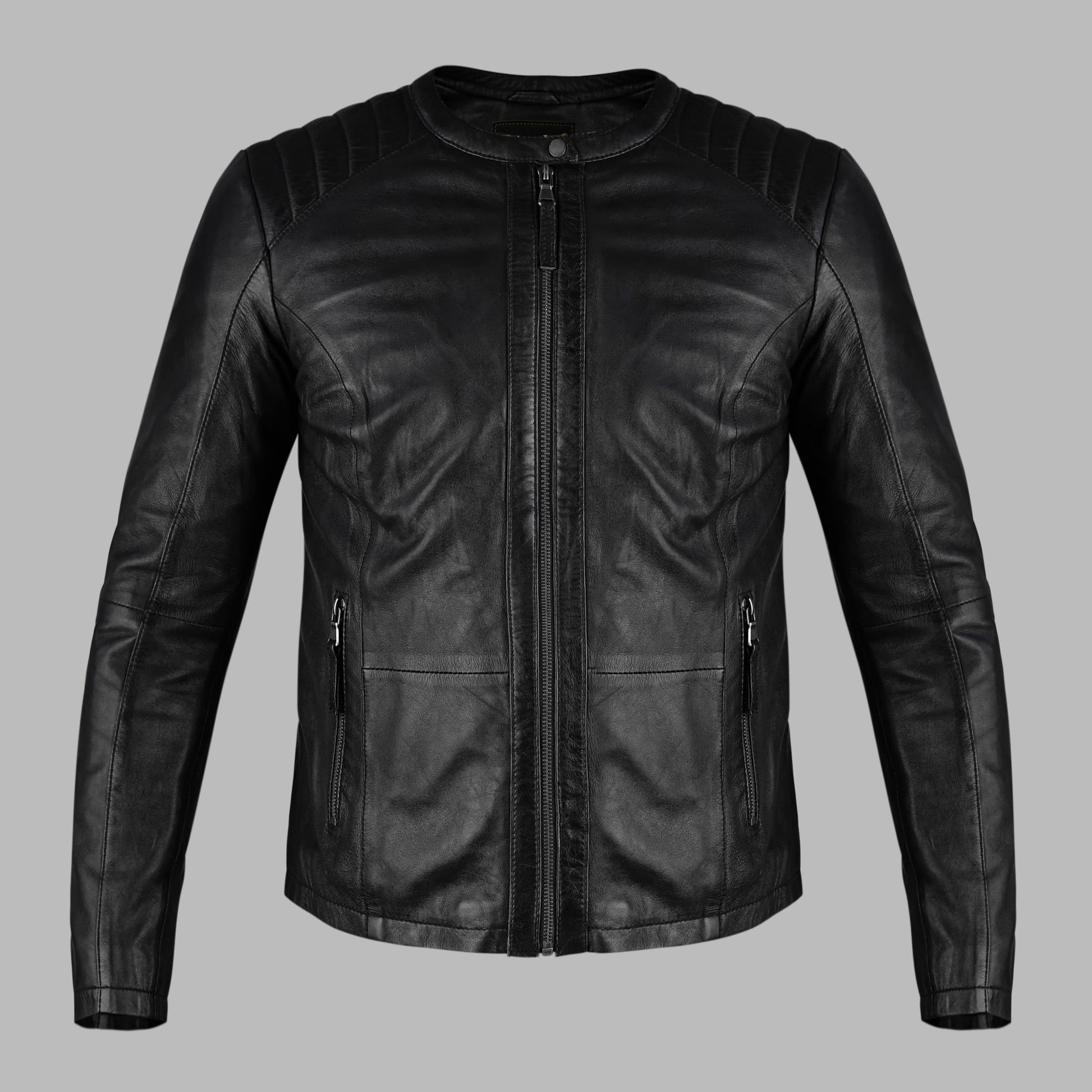 Black leather jacket on a gray background
